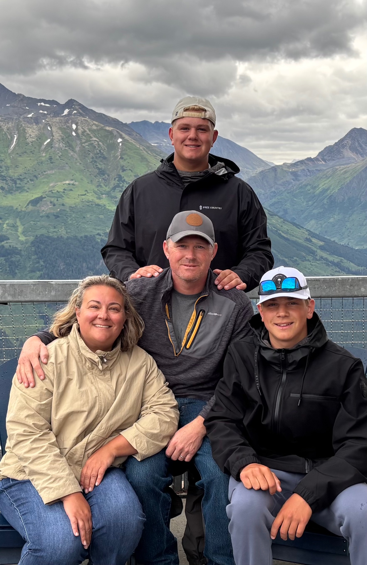 Matt Unklesbay with his family in the mountains